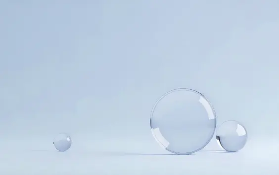 Abstract glass spheres representing connected, balanced enterprise transformation.